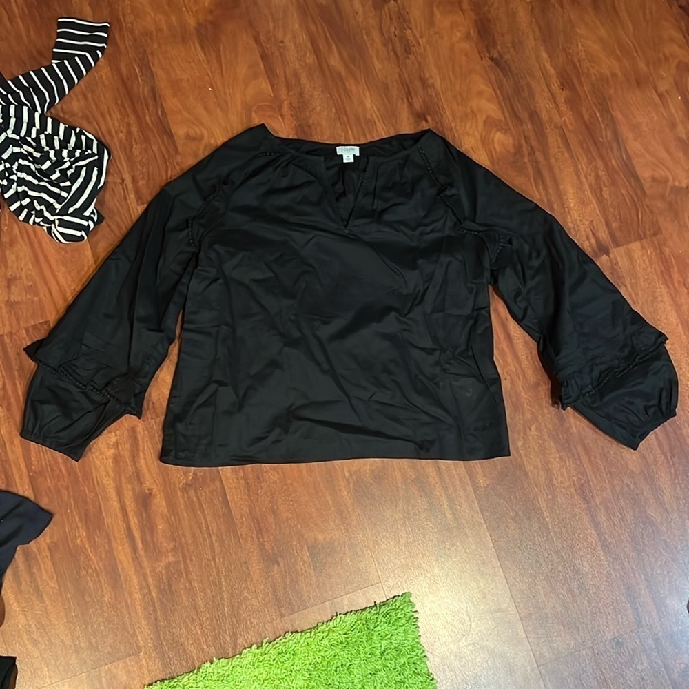 Size medium black blouse with detail at near sleeves